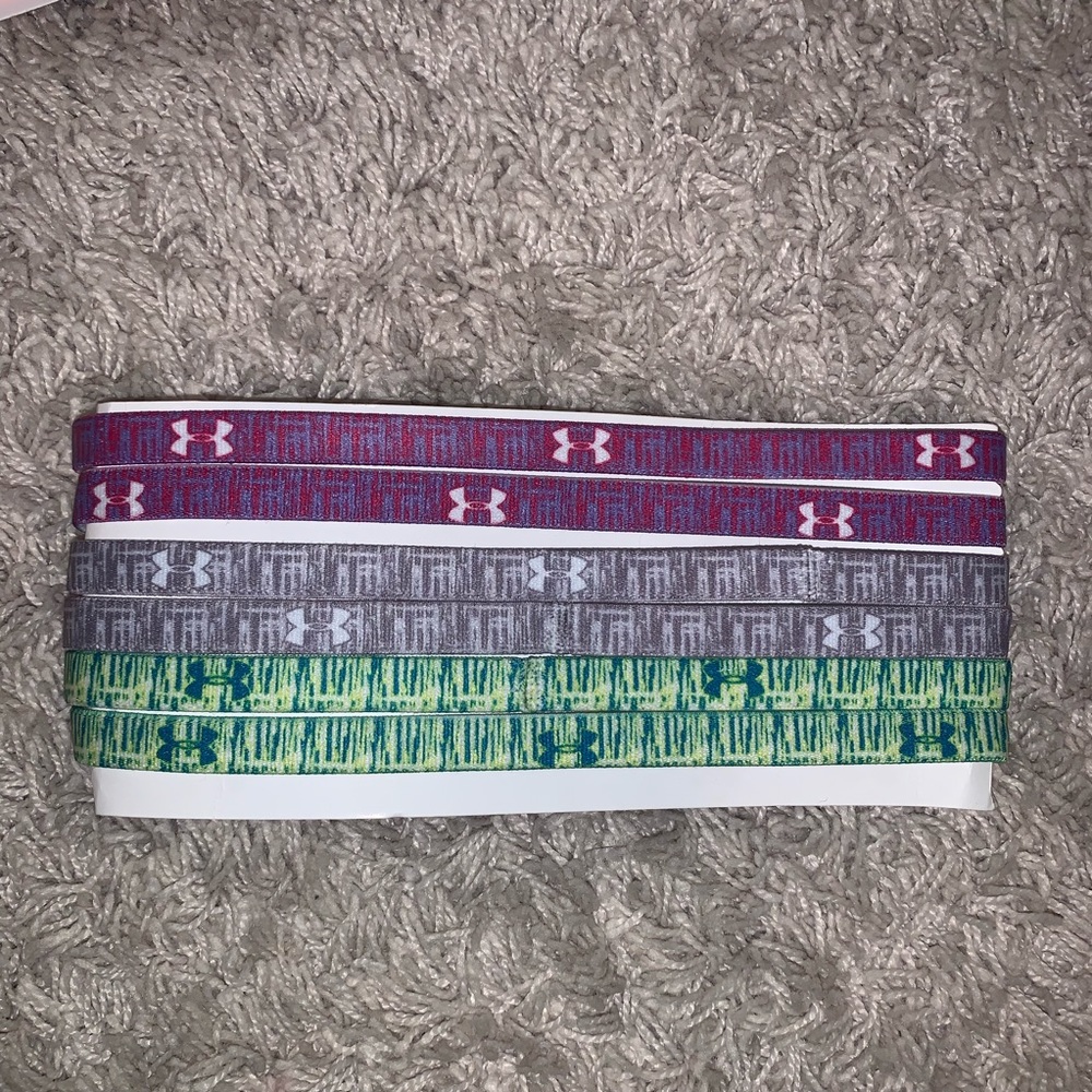 6 patterned Under Armour headbands